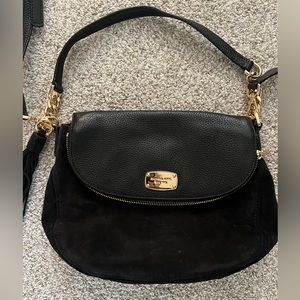 Black mixed media leather and suede crossbody or shoulder bag.
